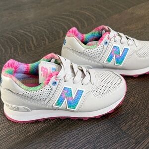 New Balance Kids' Sneakers in White and Pink with Blue Accents